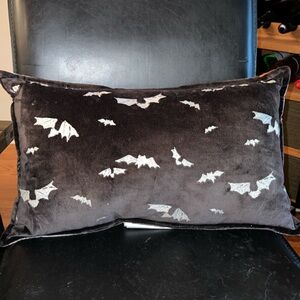 Velvet soft black Halloween pillow with bat designs 
Like new